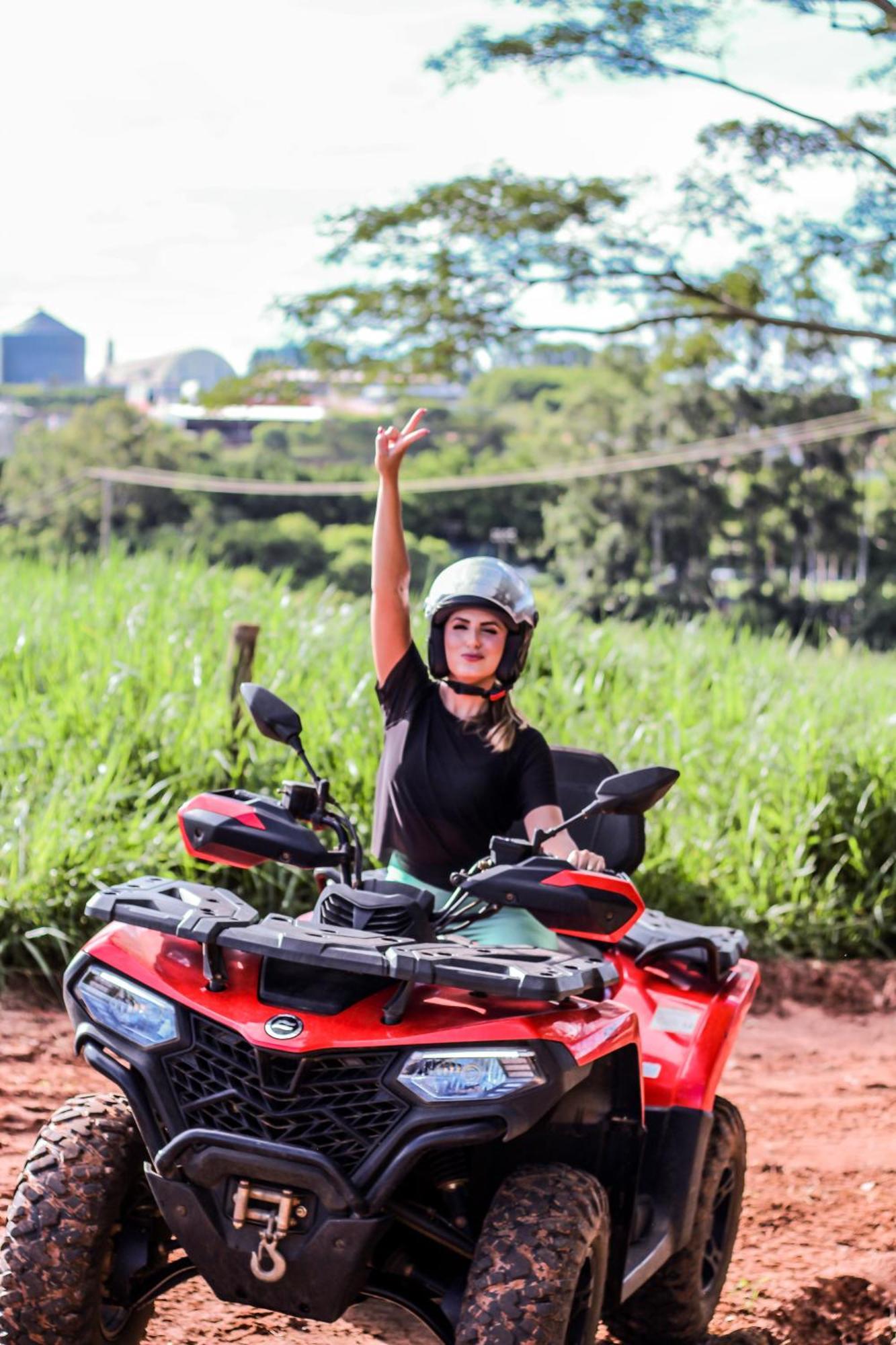 Blue Tree Thermas De Lins Resort Eksteriør billede A woman on a quad bike